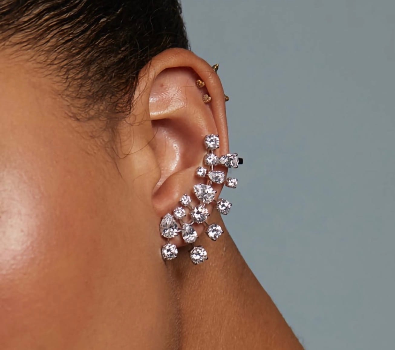 Scattered diamond ear climber worn on the ear